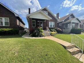 Building Photo - 1.5 story 2 bedroom and 2 bath bungalow