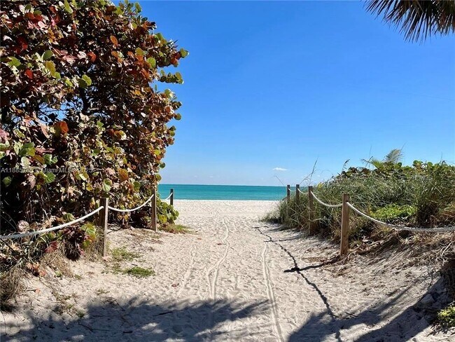 Building Photo - 6423 Collins Ave