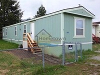 Building Photo - 2 Bed 1 Bath Mobile with Fenced Yard and Storage Shed!