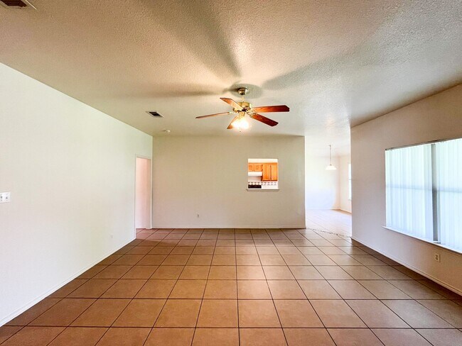 Building Photo - Available NOW!!!! Open floor plan features living room with fireplace, dining area, and large kit...