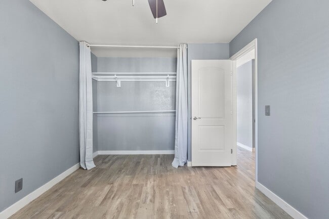 Building Photo - Discover this top-floor, two-bedroom, one-...