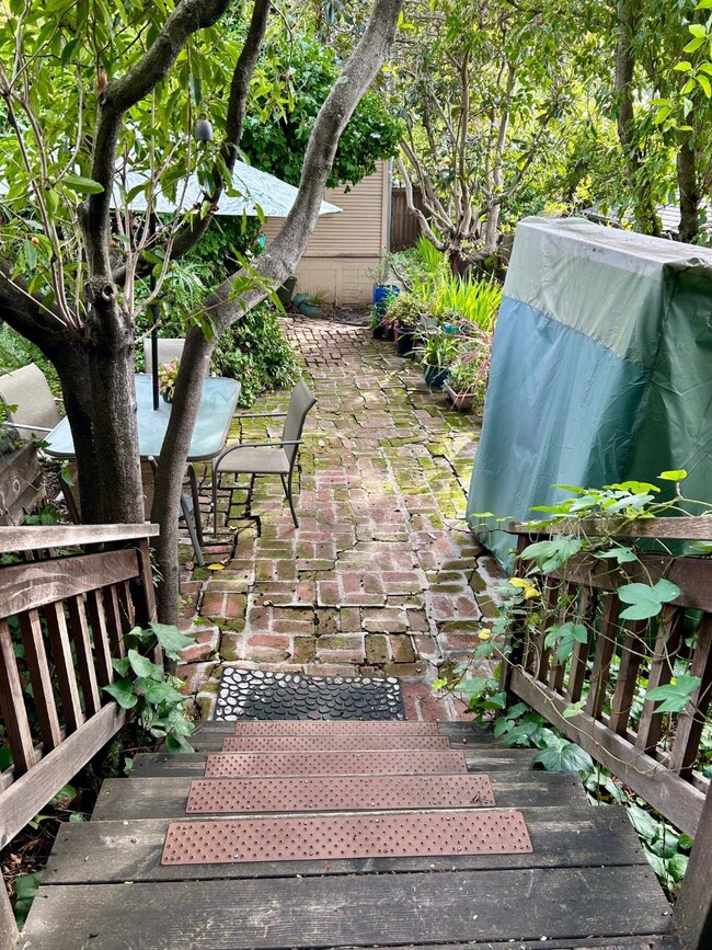 Stairs from deck - building in the back is owner's home. - 1515 Valley Rd