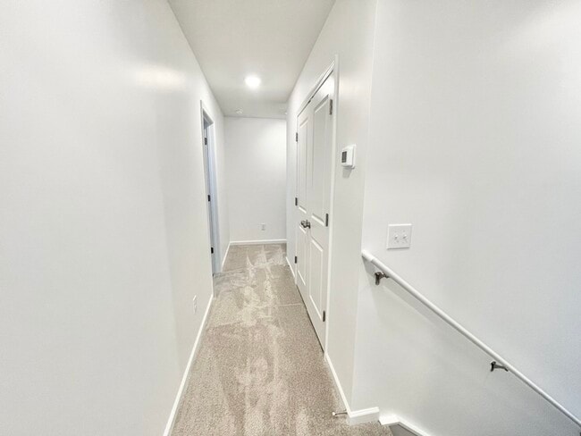 Building Photo - Three bedroom 2 1/2 bath paired home. Clos...