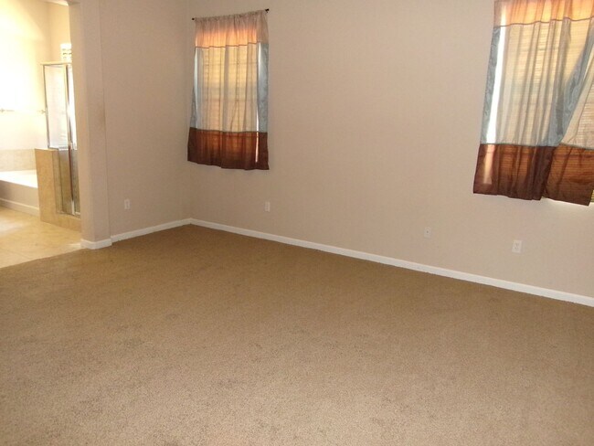 Building Photo - Spacious home located in gated community.