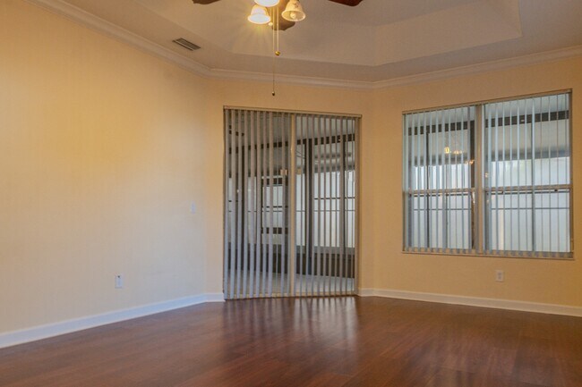 Building Photo - Spacious 5BR Home in Falcon Trace | 3-Car Garage | Screened Patio | Resort-Style Amenities Rent: ...