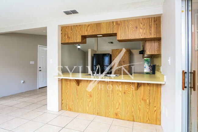 Building Photo - The living is easy in this 3 bedroom, 2 ba...