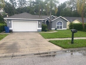 Building Photo - 7050 Woodibis Dr