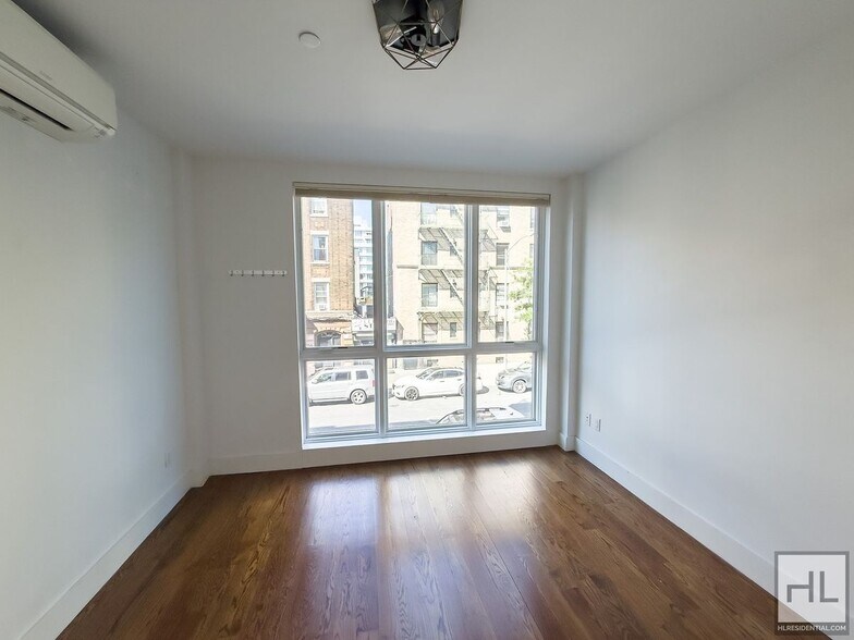 Building Photo - Stunning Two-Bedroom Duplex with Soaring 1...