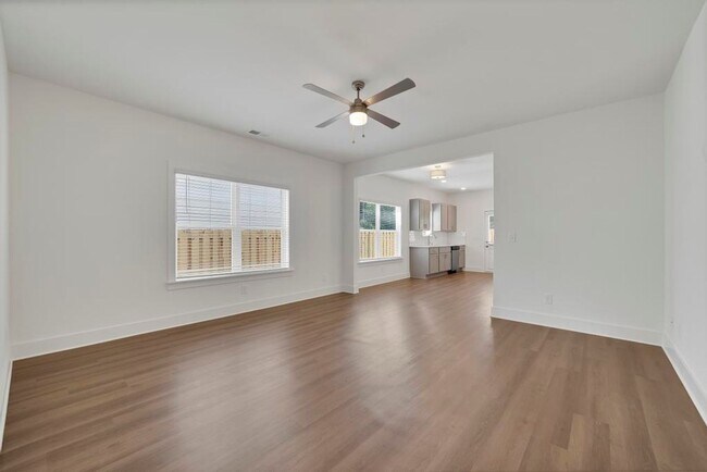 Building Photo - One Level Home with Garage and Fenced Back...