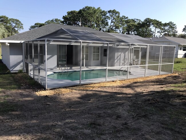 Building Photo - 5592 W Woodside Dr