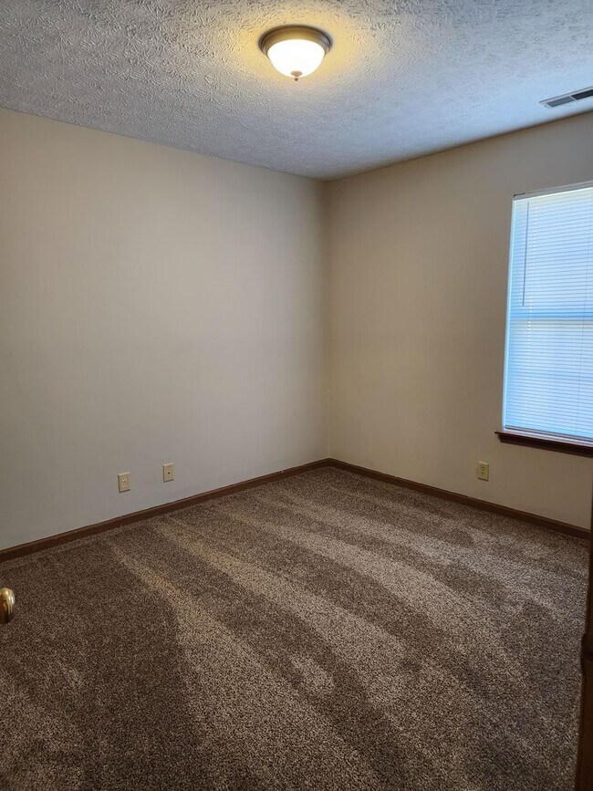 Building Photo - Newly Renovated! 3 Bedroom, 2 Bath, 2 Car ...