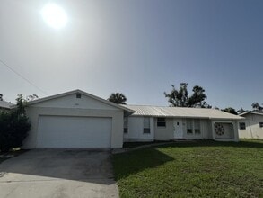 Building Photo - ** Single Family Home - Port Charlotte - 2 Bed / 2 Bath Plus Den/Bonus Room - Annual Rental - $1,...