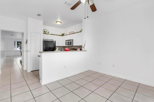Building Photo - 18520 NW 67th Ave