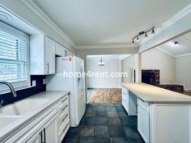 Building Photo - A Lovely Four Bedroom Home in Lenexa w/ Wood Floors, Finished Basement and a Fenced Yard!