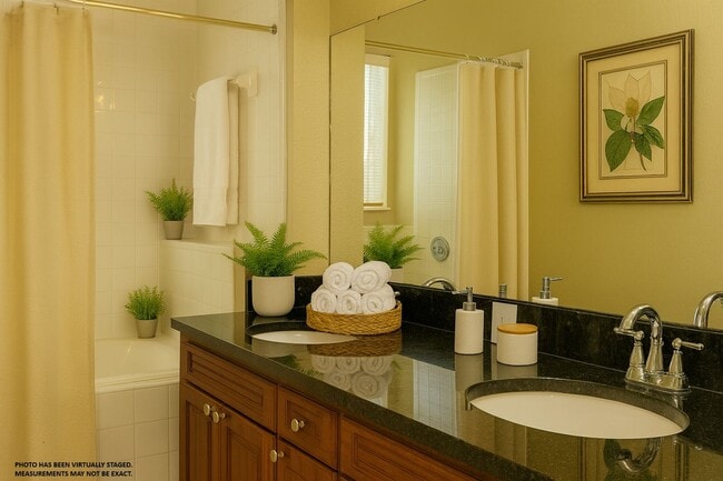 Building Photo - Spacious 2 bed 2 bath condo, split floorplan on the 3rd floor! Gated community at Mosaic at Millenia