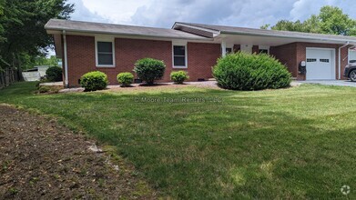 Building Photo - 3 Bed / 2 Bath on 1 Level - Garage, Lawn C...