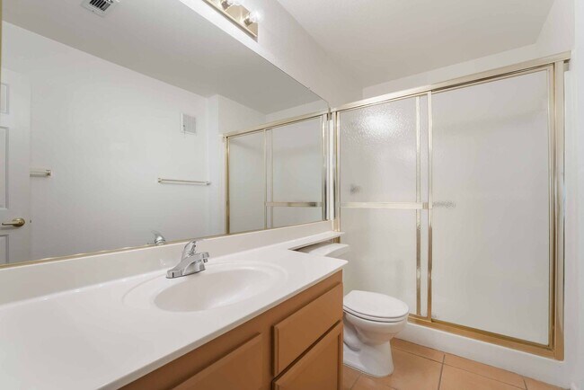 Building Photo - Charming First-Floor Home with Open Living and Private Patio