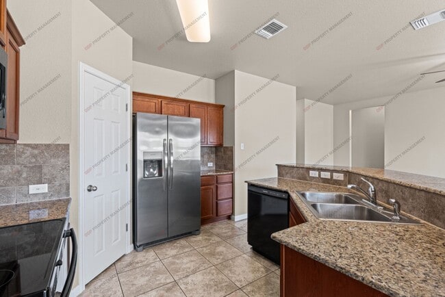 Building Photo - 8012 Redbrush