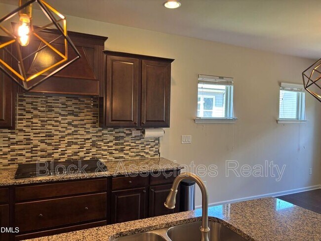 Building Photo - 1009 Magnolia Blossom Ln