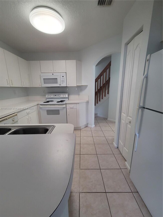 Building Photo - 14385 SW 120th Ct
