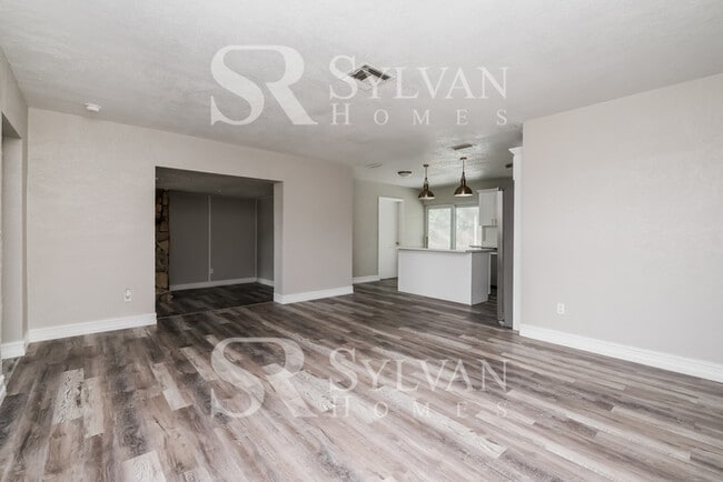 Building Photo - You Can Afford to Dwell Well.