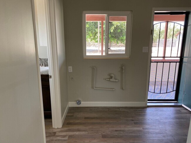 Building Photo - A Welcoming 3-Bedroom with Outdoor Room to Breathe