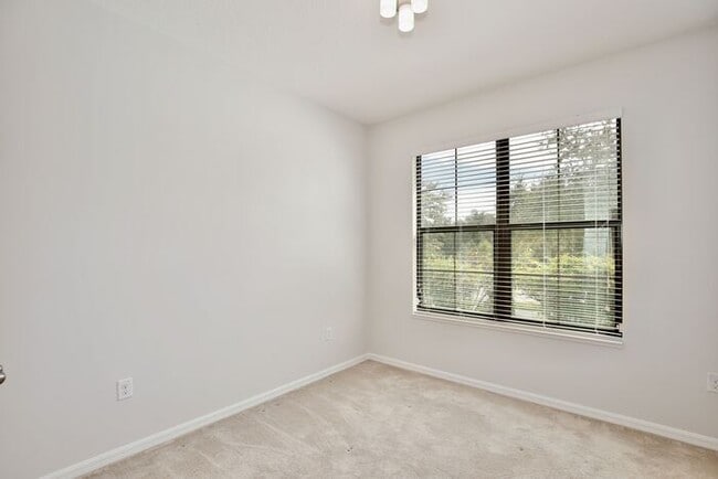 Building Photo - Stylish 4/3 Home with Covered Patio & Gara...