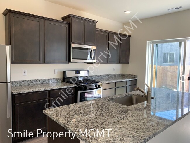 Building Photo - A nice house with 5 beds rooms and 2.5 baths.