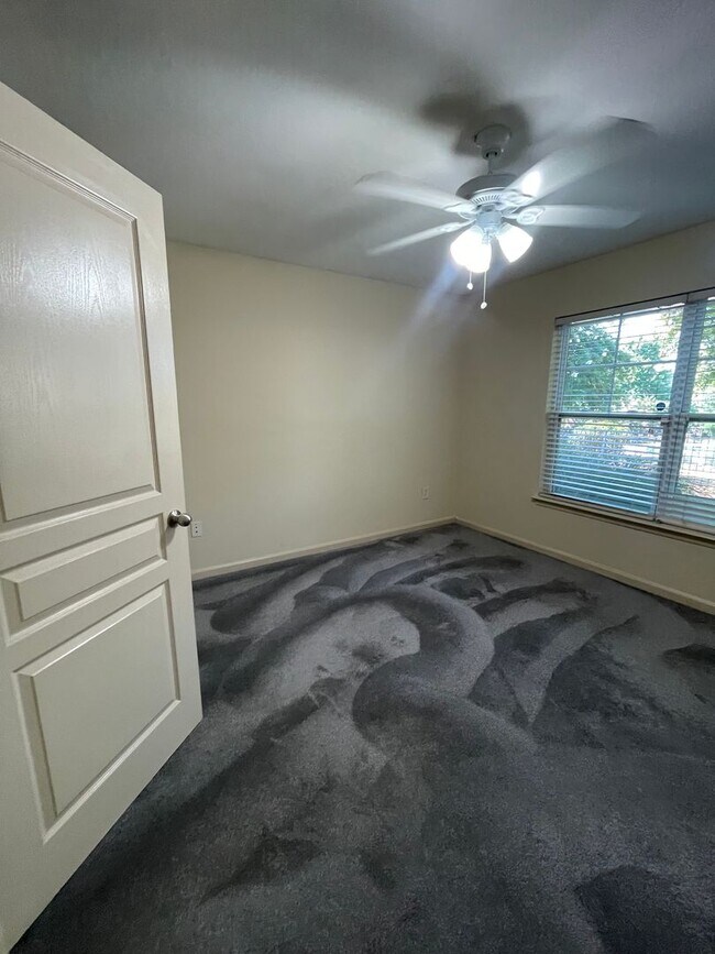 Building Photo - Two Bedrooms Available in this Three Bedroom Flat, Female Applicants!