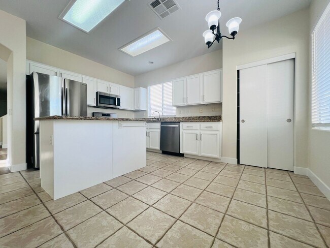 Building Photo - REMODELED, SPACIOUS, 4 BEDROOM HOME WITH VAULTED CEILINGS AND LOFT