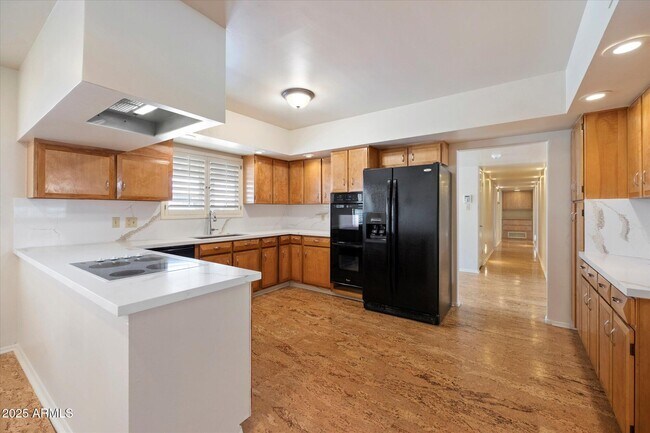 Building Photo - 5019 E Rovey Ave