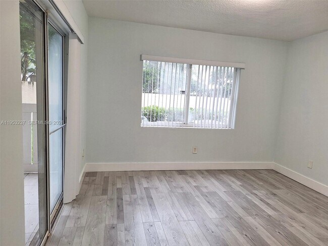 Building Photo - 18810 NW 57th Ave