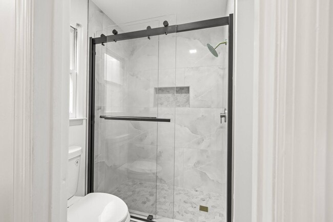 Building Photo - Renovated Home on Large Corner Lot in Coveted Strathy Hall