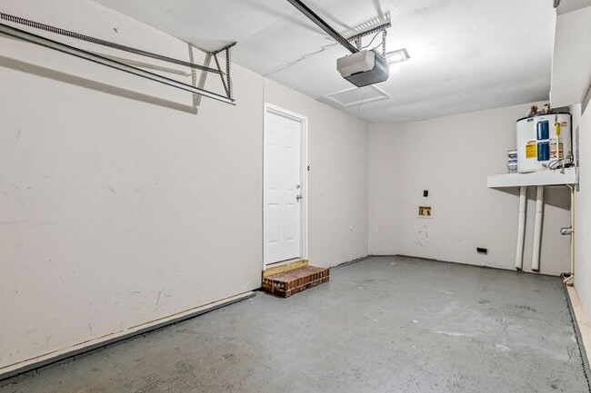 Building Photo - NW - Updated Home with Granite Counter-tops, Fire Place, Deck, Storage Building, Garage!