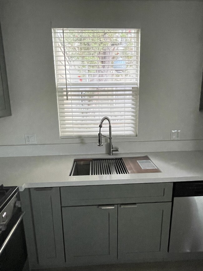 Cutting board built into sink - 3146 Rowena Ave