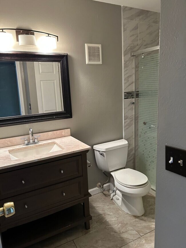 Building Photo - Top-Floor Condo with Trail Access + Community Perks!