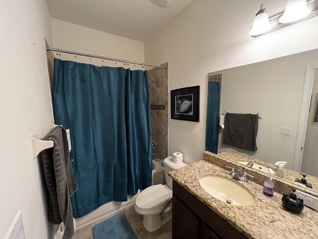 Building Photo - "Spacious 4-Bedroom Lutz Home with Elegant...