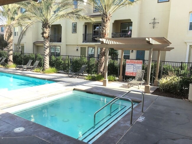 Building Photo - Beautiful 2 Bedroom Condominium with Attached Garage Located in Gated Community of Eastvale