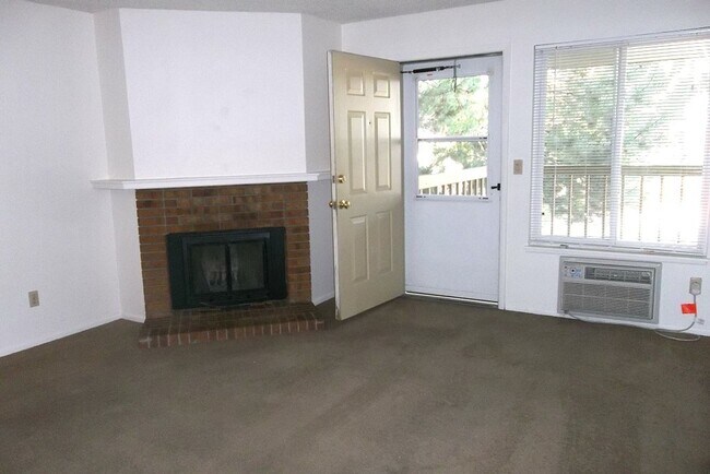 Building Photo - Prime Riverside Condo Steps from Edora Park & Trails