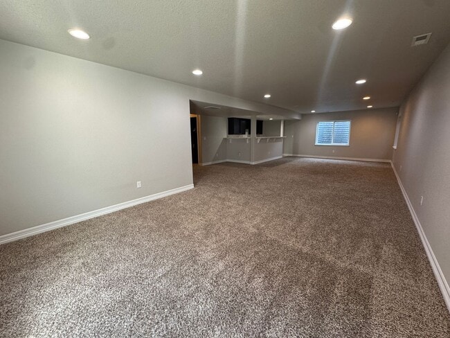 Building Photo - Spacious 5-Bedroom Ranch with Finished Basement, Wet Bar & 3-Car Garage