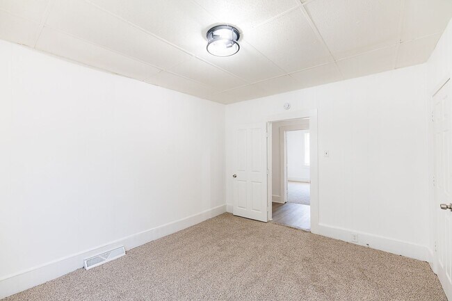 Building Photo - Move-In Ready 4BR Home with Large Backyard