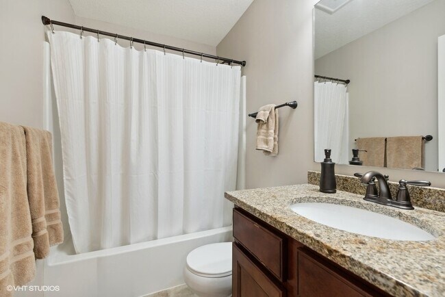 Bathroom with Granite countertops - 4505 Yellowstone Ln N