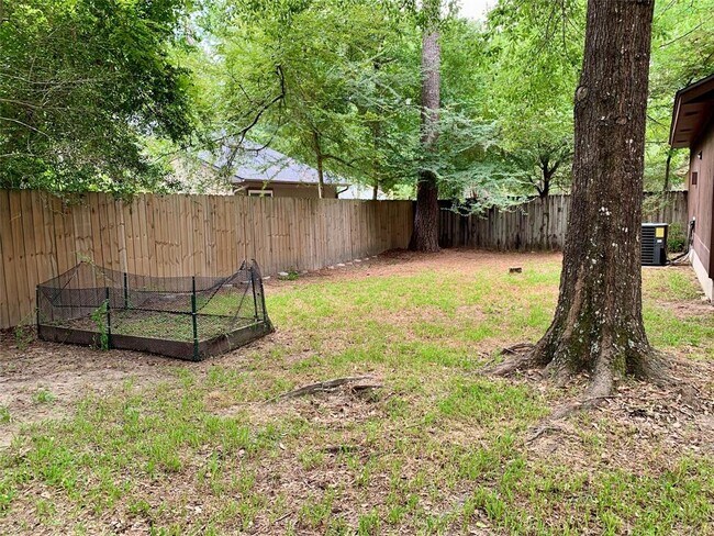 Building Photo - 22 N Wavy Oak Cir