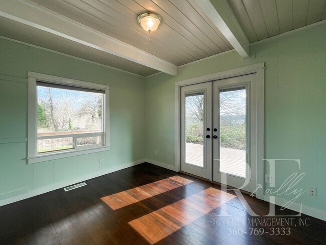 Building Photo - Whimsical Craftsman with Wraparound Porch, Bonus Room & Liberty Bay Peek Views