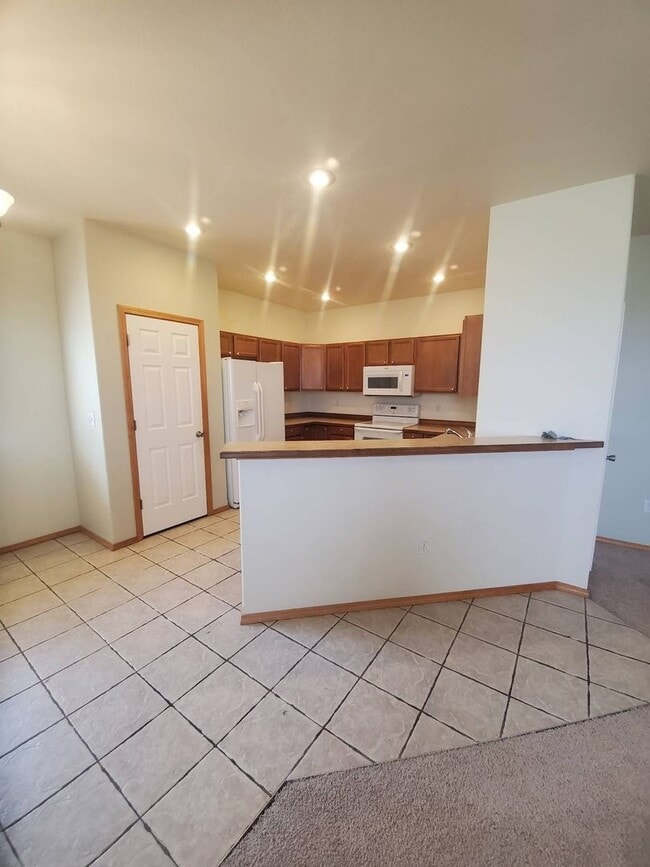 Building Photo - Triple Car Garage & New Interior Paint