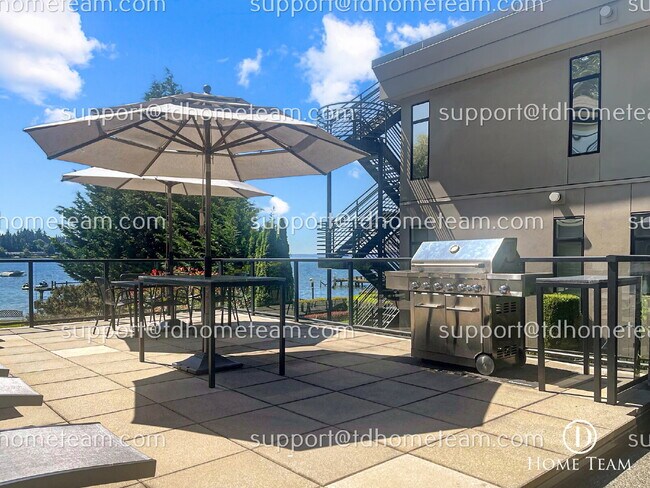 Building Photo - "Charming 1-Bed Waterfront Retreat with Scenic Lake Views & Pool in Kirkland!"