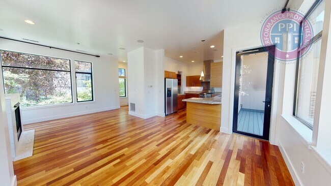 Building Photo - Riverfront Location, Luxury Townhome - End Corner Unit, Two En-Suites, Attached Garage