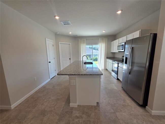 Building Photo - 1210 Port Blue Wy