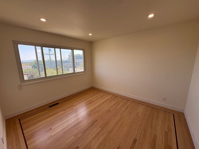 Building Photo - Open House Sunday 4/19 11 am - 12 pm:  Beautifully Updated Corner-Lot Home in Millbrae – Spacious...