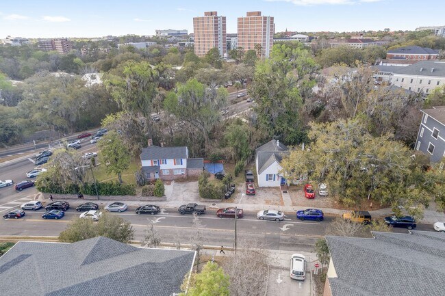 Building Photo - 6-Bedroom Home: Includes 6 parking spots!